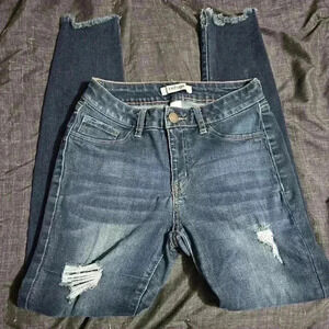 Ladies distressed refuge dark wash jeans!